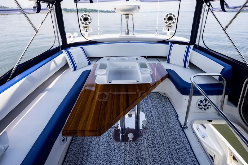 Slide: The Image of Luxurious 2007 Azimut 43 yacht interior with elegant seating and polished wooden table. - 15