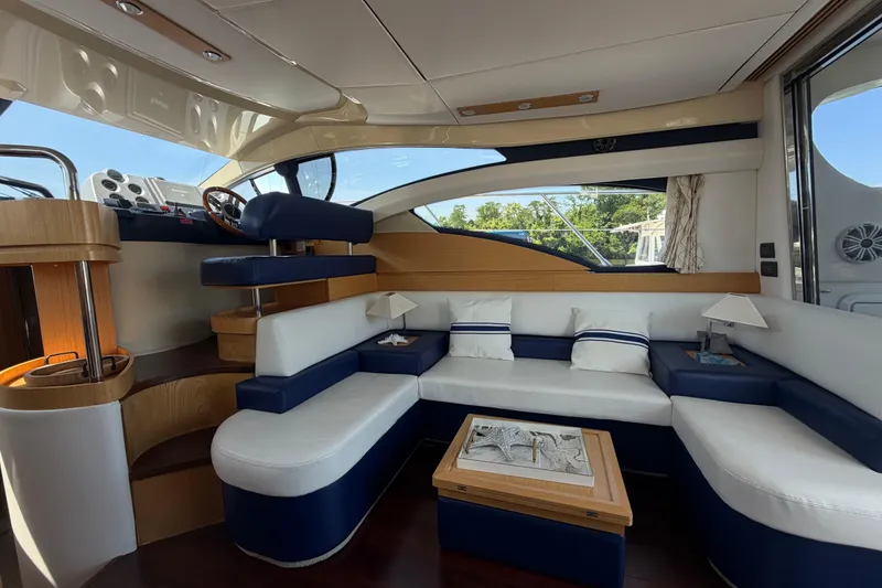 Slide: The Image of Luxurious interior of a 2007 Azimut 43 yacht with elegant seating and modern design. - 10