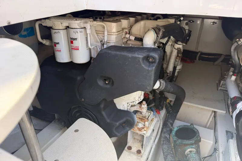 Slide: The Image of Engine room of a 2007 Azimut 43 yacht, showcasing mechanical components and filters. - 30