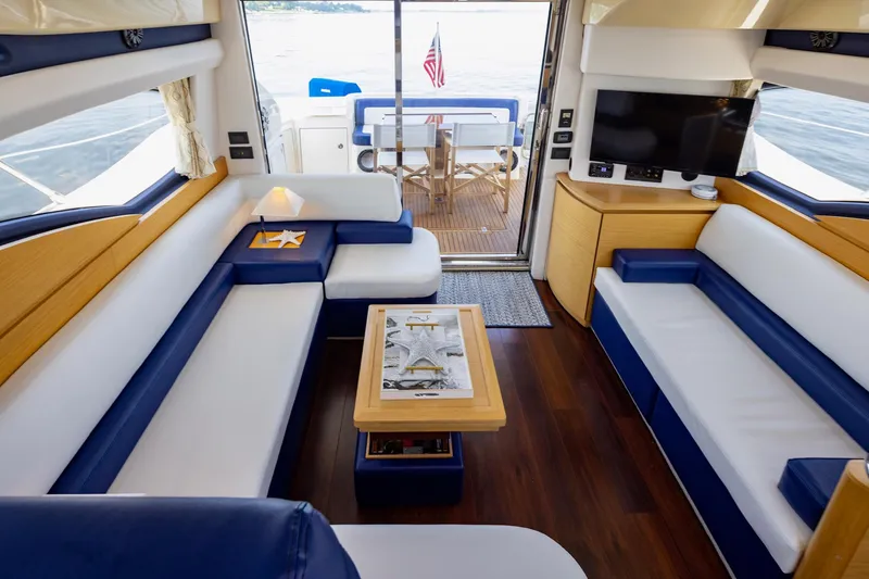Slide: The Image of Luxurious interior of a 2007 Azimut 43 yacht with elegant seating and modern amenities. - 8