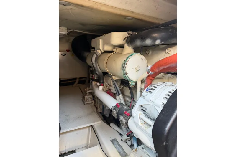 Slide: The Image of Engine compartment of a 2007 Azimut 43 yacht, showcasing mechanical components. - 28