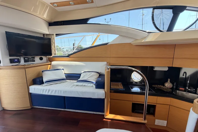 Slide: The Image of Luxurious interior of a 2007 Azimut 43 yacht with modern amenities and elegant design. - 8