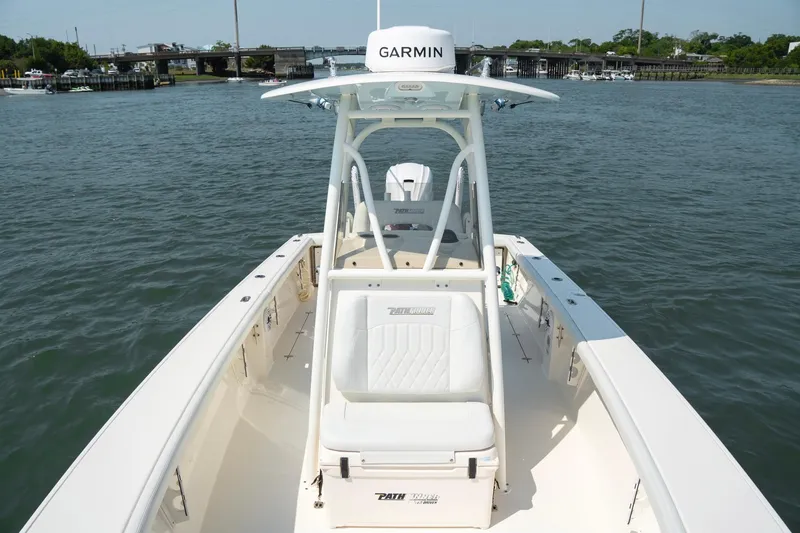 Slide: The Image of 2024 Pathfinder 2700 Open boat on water, featuring Garmin equipment and sleek design. - 19
