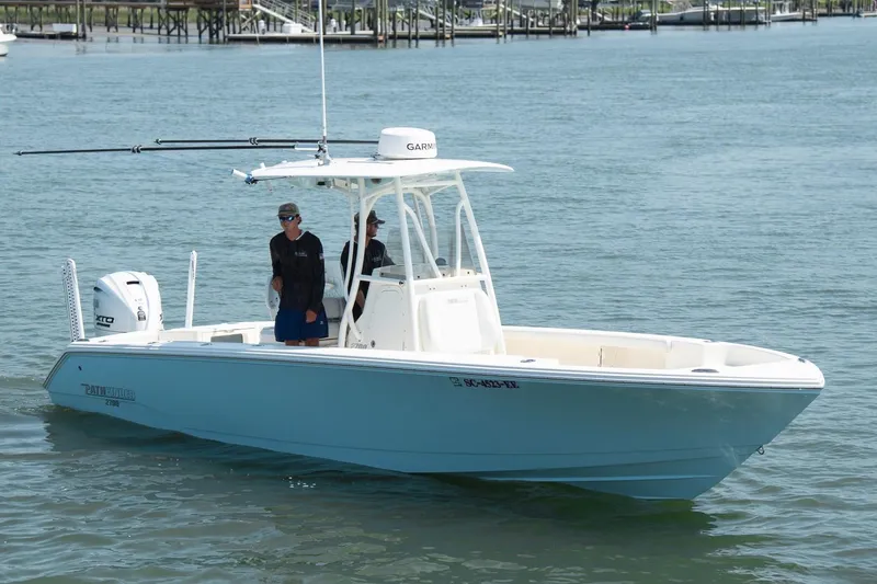 Slide: The Image of 2024 Pathfinder 2700 Open boat on water, featuring sleek design and modern equipment. - 7