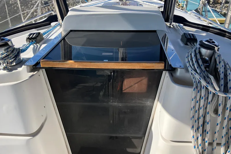 Slide: The Image of Cockpit view of a 2005 Hunter 36 sailboat with winches and ropes. - 21