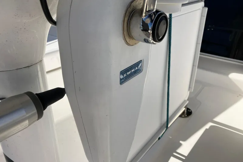 Slide: The Image of Close-up of a 2005 Hunter 36 sailboat winch with Lewmar branding. - 57