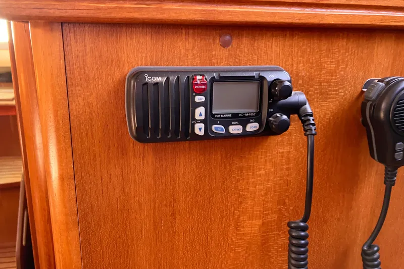 Slide: The Image of VHF marine radio on 2005 Hunter 36 sailboat's wooden interior panel. - 34