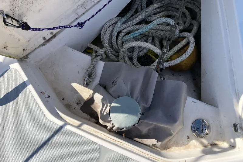 Slide: The Image of Anchor locker of a 2005 Hunter 36 sailboat with ropes and equipment. - 17