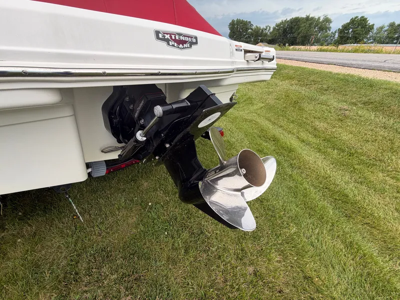 Slide: The Image of The image shows the stern of a 2012 Chaparral 206 SSi boat with an outboard motor. - 6