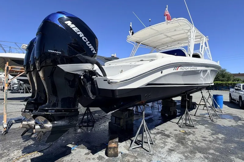 Slide: The Image of 2008 Midnight Express 37 Cabin boat with Mercury Verado engines on dry dock. - 14