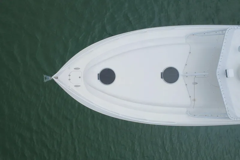 Slide: The Image of Aerial view of 2008 Midnight Express 37 Cabin boat on calm water. - 21