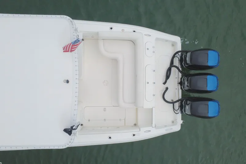 Slide: The Image of Overhead view of 2008 Midnight Express 37 Cabin boat with triple engines. - 22