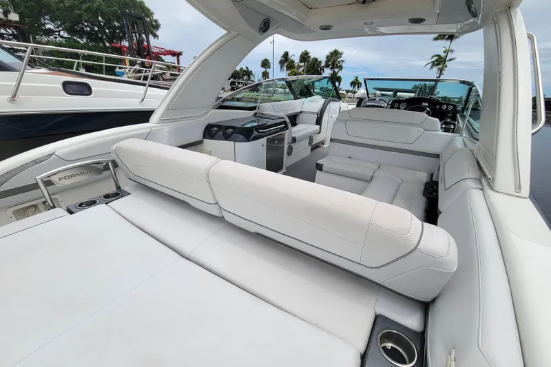 Slide: The Image of 2019 Formula 350 Crossover Bowrider interior with luxurious seating and modern design. - 10