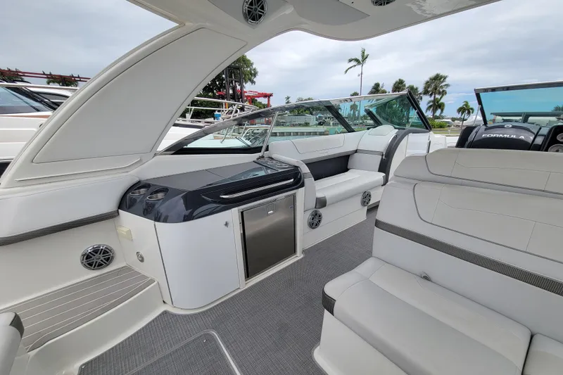 Slide: The Image of 2019 Formula 350 Crossover Bowrider interior with luxurious seating and modern amenities. - 11