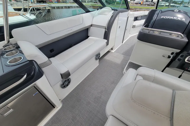 Slide: The Image of 2019 Formula 350 Crossover Bowrider interior with luxurious seating and modern amenities. - 13