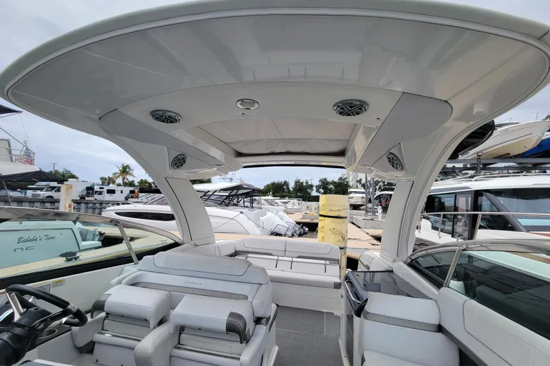 Slide: The Image of 2019 Formula 350 Crossover Bowrider interior with sleek seating and modern design. - 14
