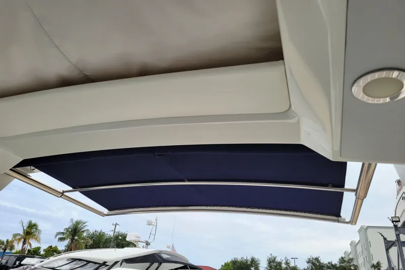 Slide: The Image of 2019 Formula 350 Crossover Bowrider with retractable sunshade canopy. - 15
