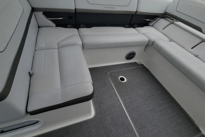 Slide: The Image of 2019 Formula 350 Crossover Bowrider interior with sleek gray seating and modern design. - 16
