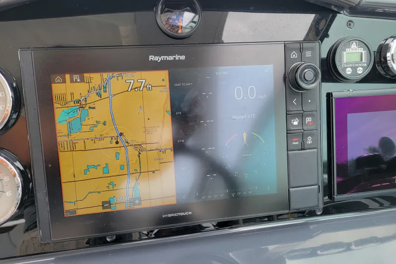 Slide: The Image of Raymarine navigation display on 2019 Formula 350 Crossover Bowrider showing map and depth. - 25