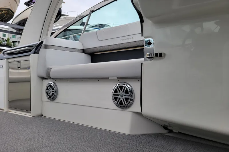 Slide: The Image of 2019 Formula 350 Crossover Bowrider interior with sleek seating and modern audio system. - 44