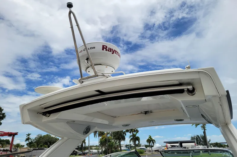 Slide: The Image of 2019 Formula 350 Crossover Bowrider radar arch with Raymarine equipment under a blue sky. - 5