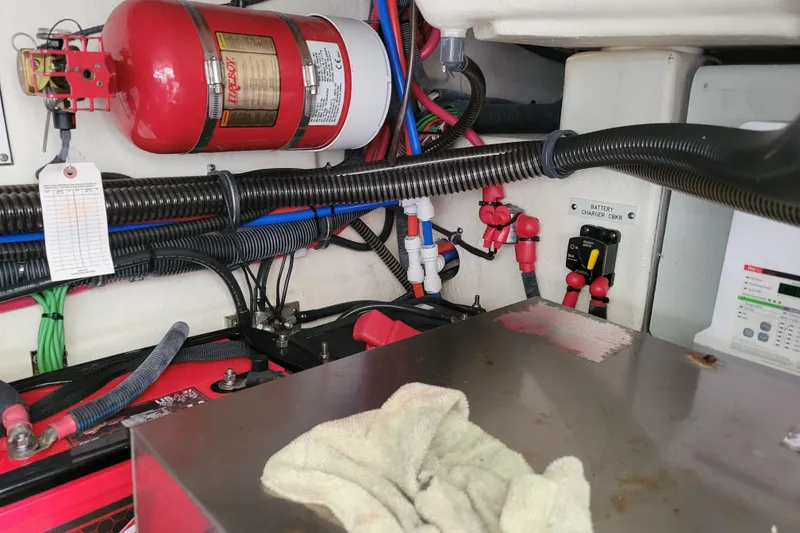 Slide: The Image of Engine compartment of 2019 Formula 350 Crossover Bowrider with fire extinguisher and wiring. - 51
