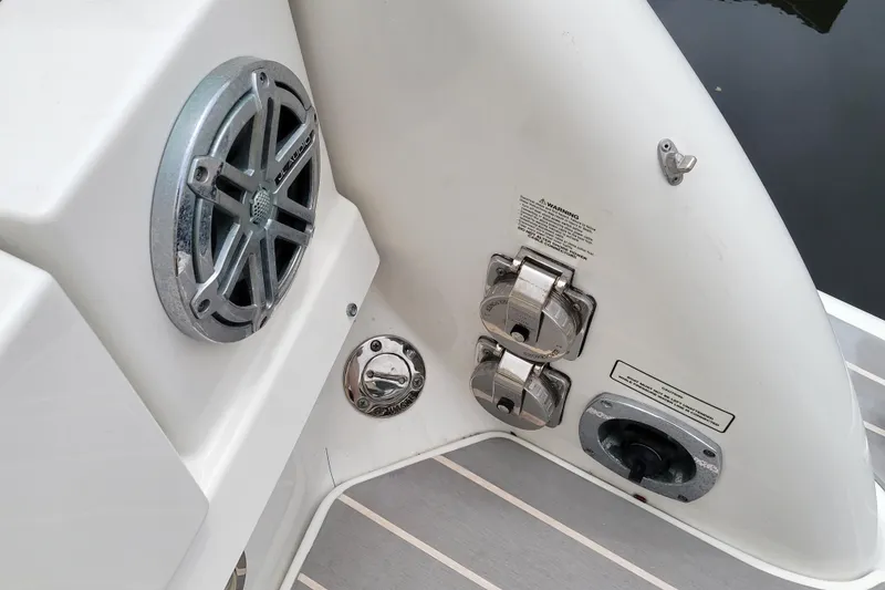Slide: The Image of 2019 Formula 350 Crossover Bowrider boat features speaker and fuel cap details. - 7