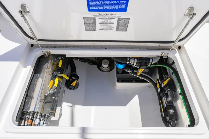 Slide: The Image of 2023 Valhalla Boatworks V-37 engine compartment with mechanical components and labels. - 47