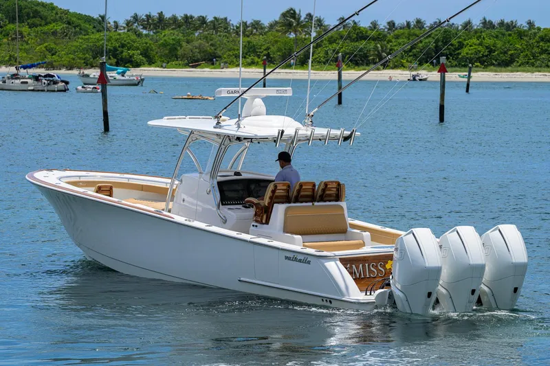 Slide: The Image of 2023 Valhalla Boatworks V-37 cruising on a serene tropical waterway. - 7