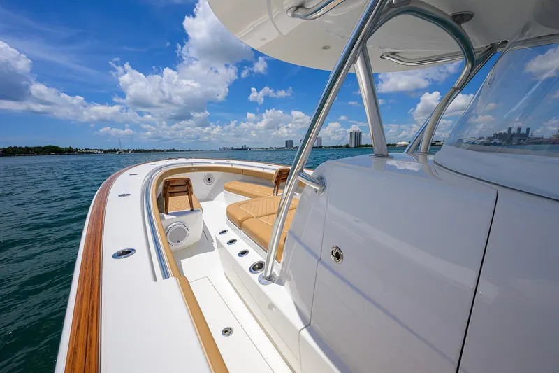 Slide: The Image of 2023 Valhalla Boatworks V-37 on water, showcasing sleek design and luxury features. - 21