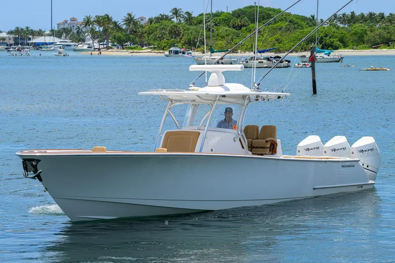 Slide: The Image of 2023 Valhalla Boatworks V-37 cruising on a sunny day near a tropical shoreline. - 4