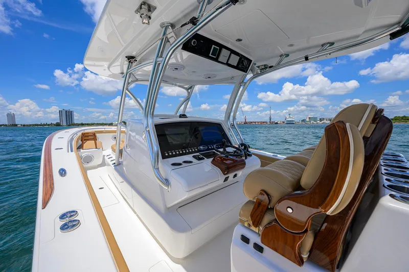 Slide: The Image of 2023 Valhalla Boatworks V-37 helm with luxurious seating on open water. - 11