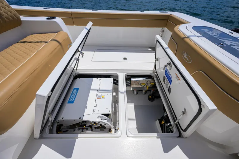 Slide: The Image of 2023 Valhalla Boatworks V-37 interior with open storage compartments on deck. - 45