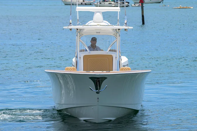 Slide: The Image of 2023 Valhalla Boatworks V-37 cruising on calm waters, front view. - 3