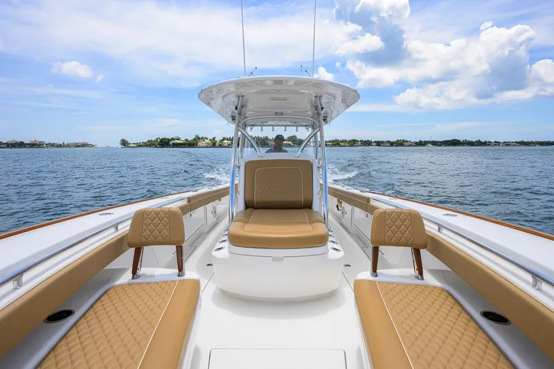Slide: The Image of 2023 Valhalla Boatworks V-37 cruising on open water under a clear sky. - 31