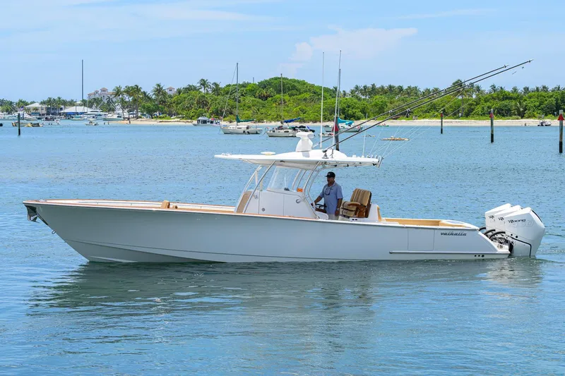Slide: The Image of 2023 Valhalla Boatworks V-37 cruising on a sunny day near a tropical shoreline. - 5