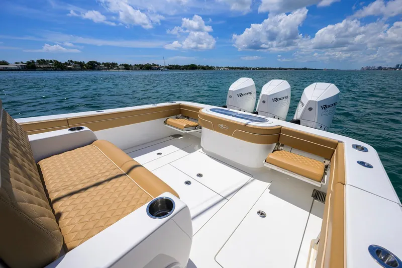 Slide: The Image of 2023 Valhalla Boatworks V-37 with luxurious seating and powerful engines on open water. - 40