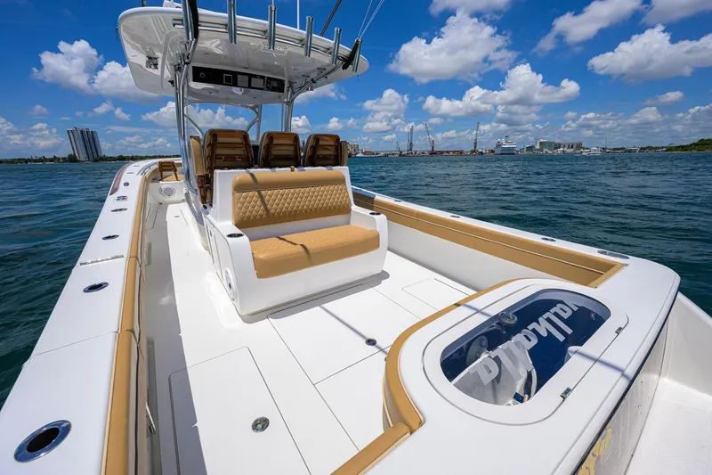 Slide: The Image of 2023 Valhalla Boatworks V-37 on water, featuring sleek design and luxurious seating. - 51