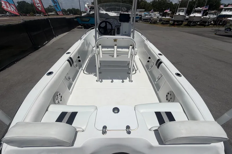 Slide: The Image of 2012 Glasstream 221 CC boat interior with seating and steering console. - 13
