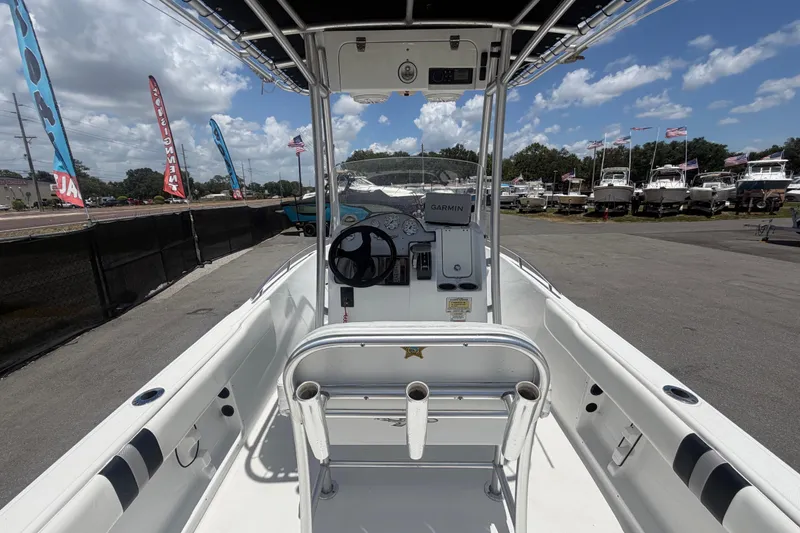 Slide: The Image of Interior view of a Glasstream 221 CC boat on a parking lot. - 14