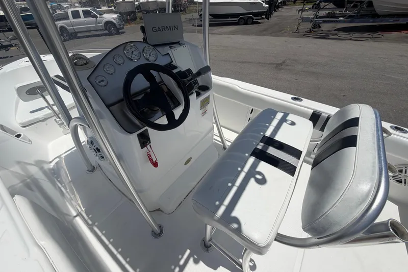 Slide: The Image of 2012 Glasstream 221 CC boat cockpit with Garmin navigation and dual seating. - 15