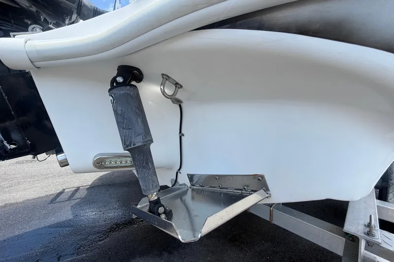 Slide: The Image of 2012 Glasstream 221 CC boat transom with trim tab and hydraulic components. - 3