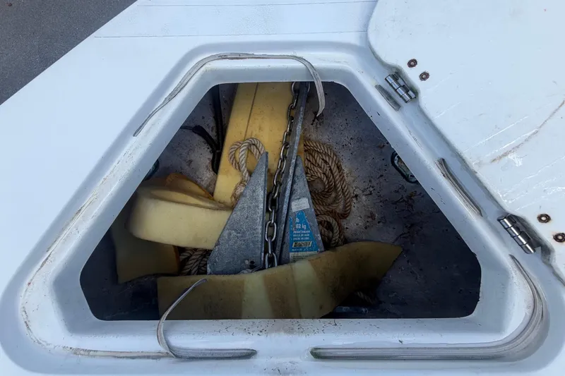 Slide: The Image of An anchor locker with chain and rope on a boat. - 33