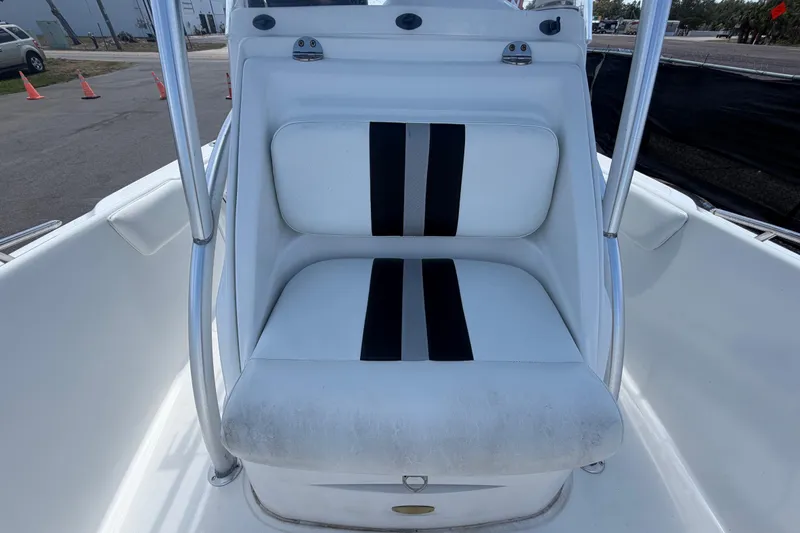 Slide: The Image of 2012 Glasstream 221 CC boat seat with black and white upholstery. - 38