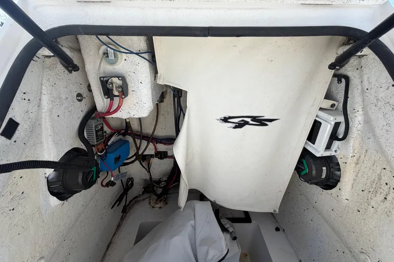 Slide: The Image of Interior view of a 2012 Glasstream 221 CC boat, showcasing wiring and components. - 41
