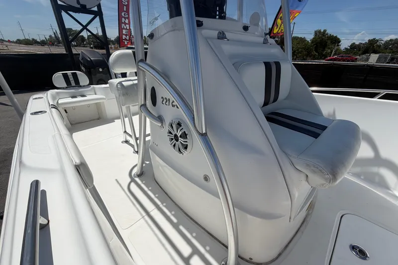Slide: The Image of 2012 Glasstream 221 CC boat interior with seating and console details. - 42