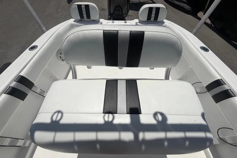 Slide: The Image of White boat seats with black stripes on a 2012 Glasstream 221 CC. - 44