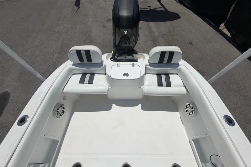 Slide: The Image of 2012 Glasstream 221 CC boat interior with seating and motor, showcasing sleek design. - 46