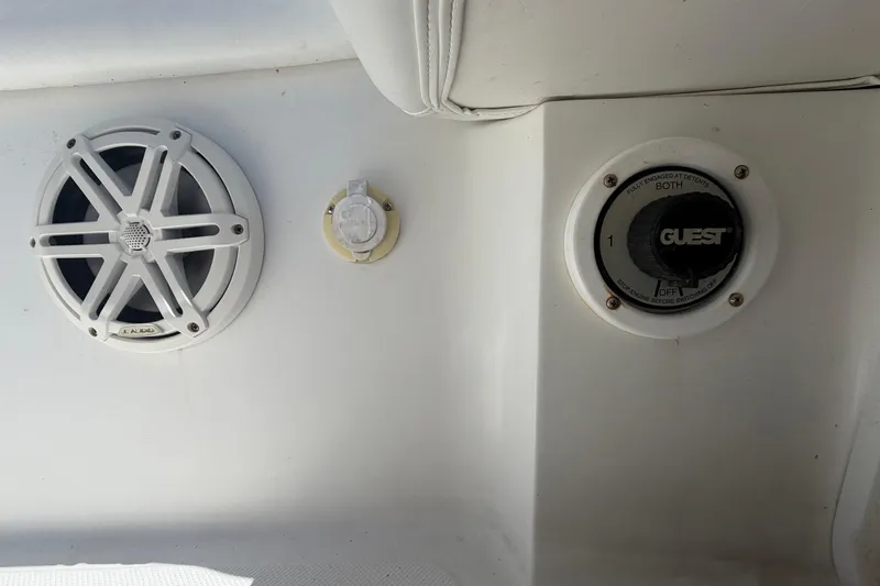 Slide: The Image of 2012 Glasstream 221 CC boat interior with speaker and control panel. - 49
