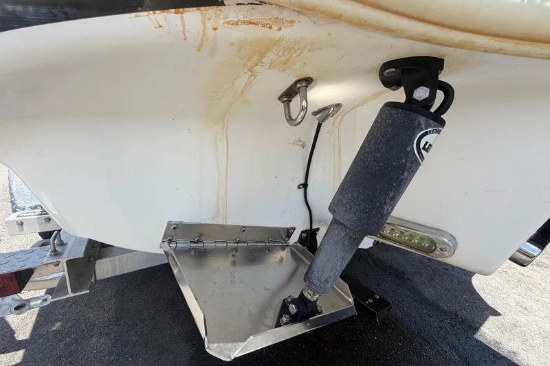 Slide: The Image of 2012 Glasstream 221 CC boat transom with trim tab and hydraulic actuator. - 6